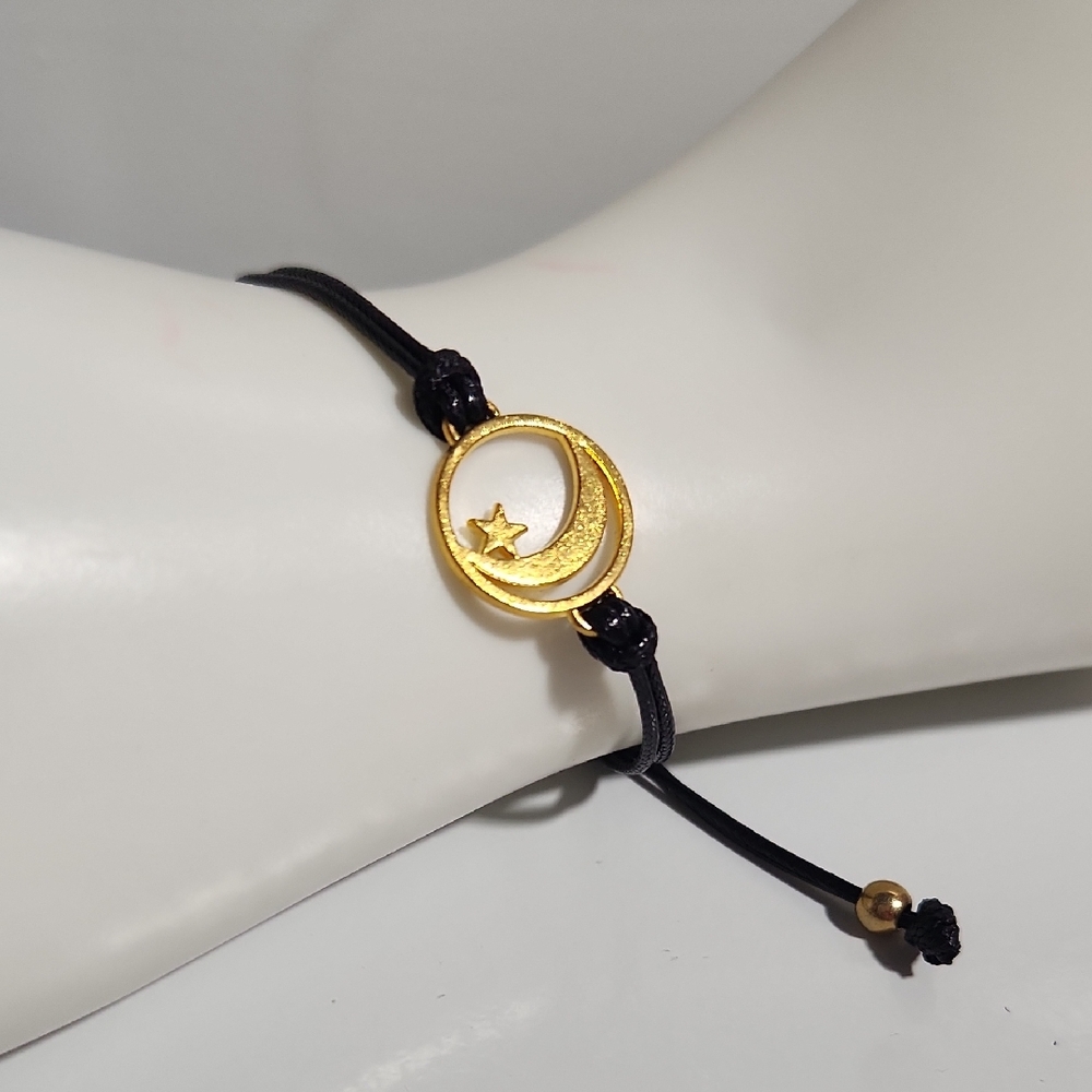 Moon and Star Gold Tone Bracelet Black Chord